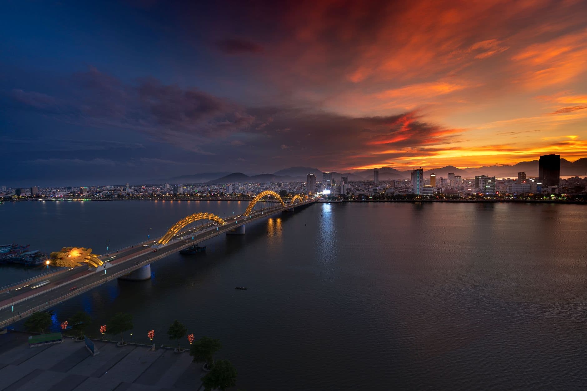 The Han River and city of Da Nang, Vietnam, at dusk.